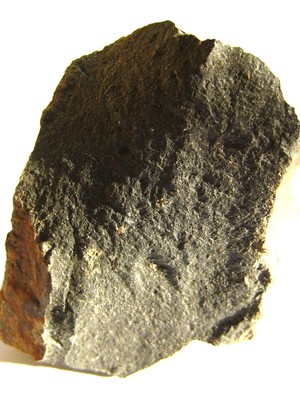 Basalte. Roche volcanique, basique et sombre. Basalte. Roche volcanique, basique et sombre.