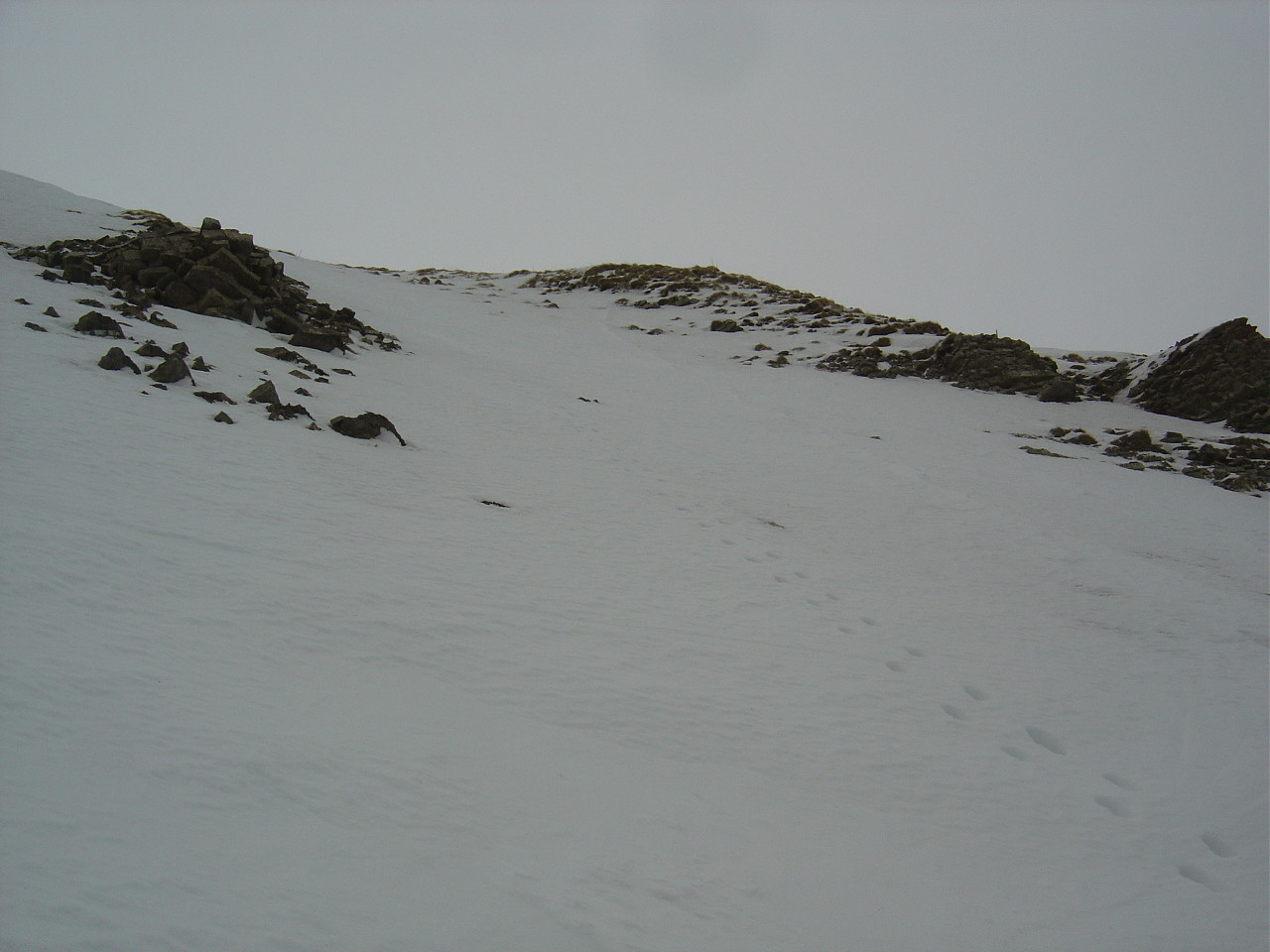 Descente de la pente sommitale