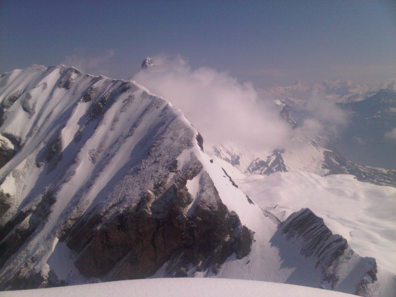 La Pointe Percée juste visible au dessus du cumulus