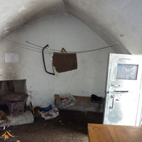 Refuge de Tuquerouye - Pièce commune avec le poèle