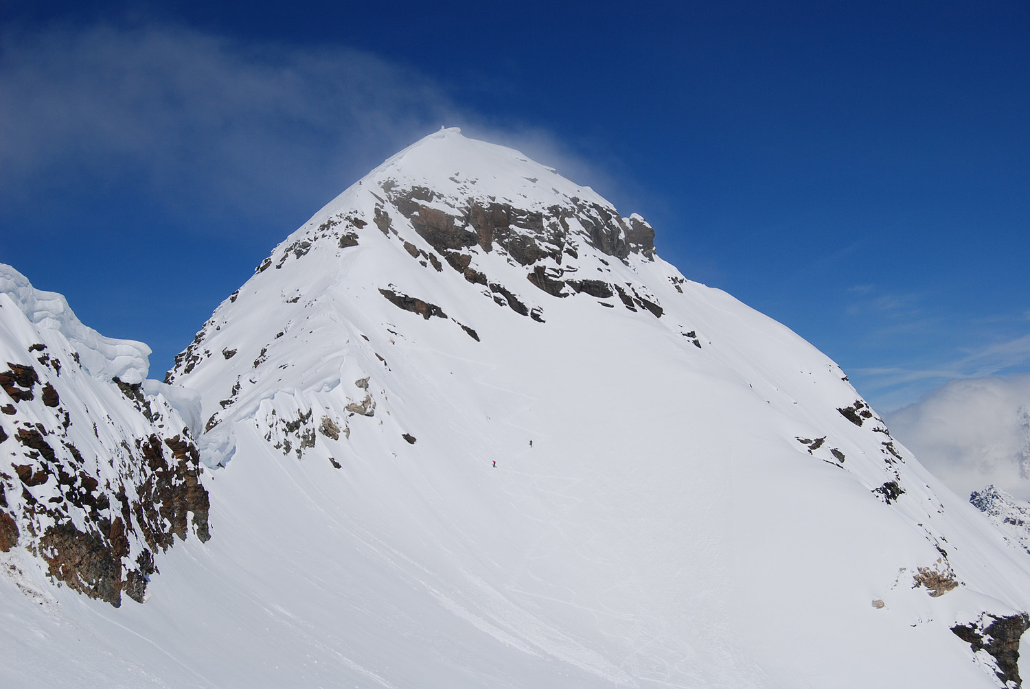 Il ripido tratto finale prima di raggiungere la cresta E del Pizzo Scalino 3323 m.