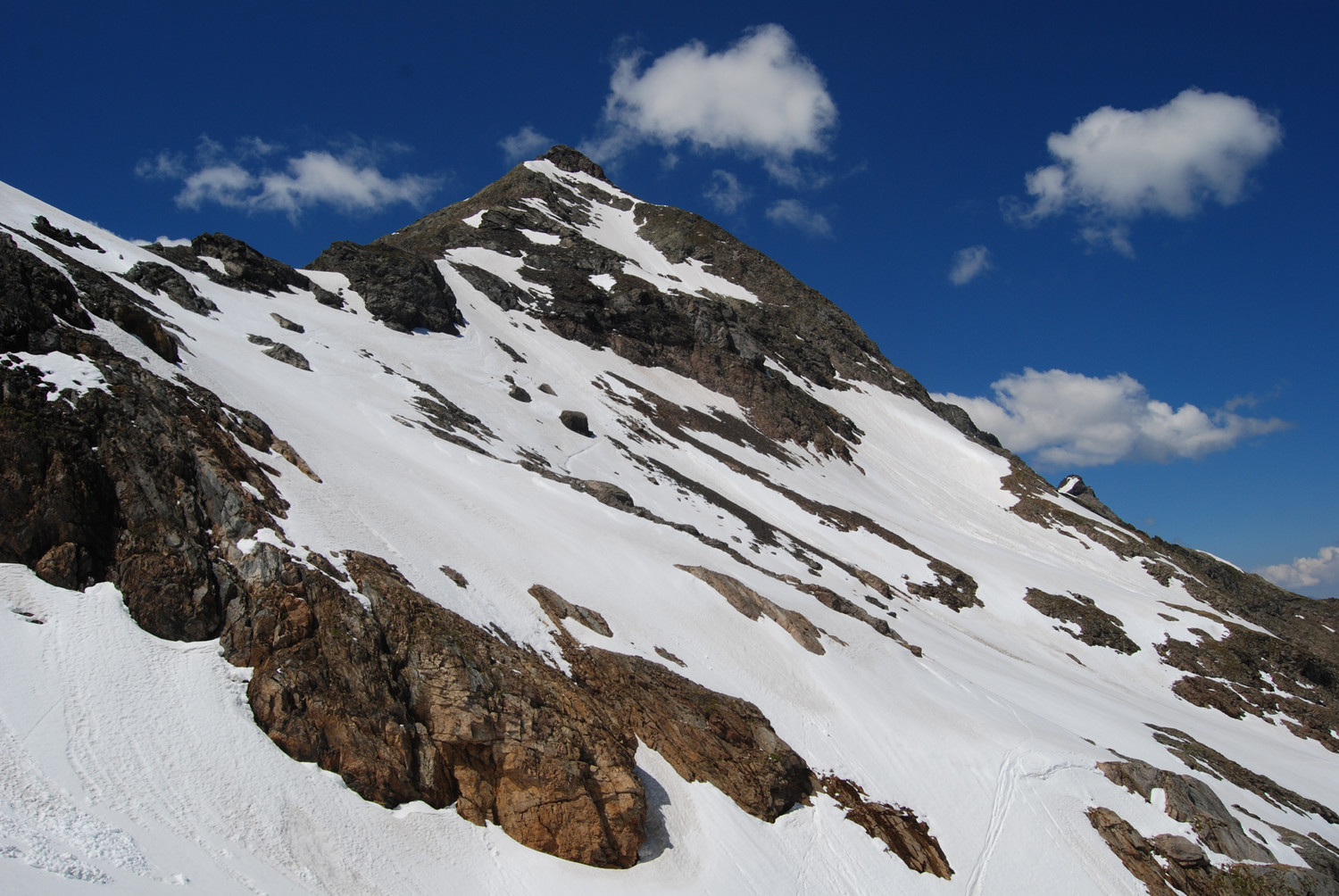 Il versante E del Pizzo del Diavolo di Malgina 2926 m dal Passo dell'Omo di Malgina 2621 m