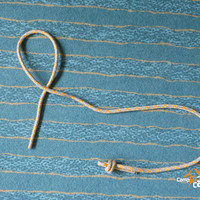 Boucle autodébloquante haut