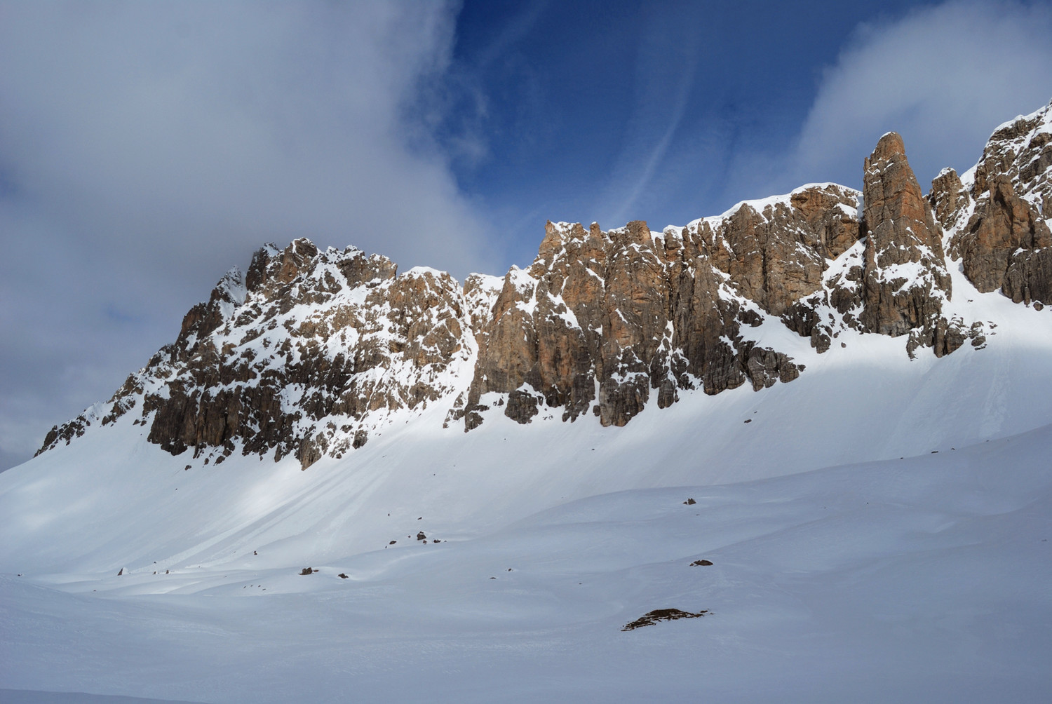 Durante la salita alla Pizza Grossa vista sul roccioso Piz Mitgel 3159m