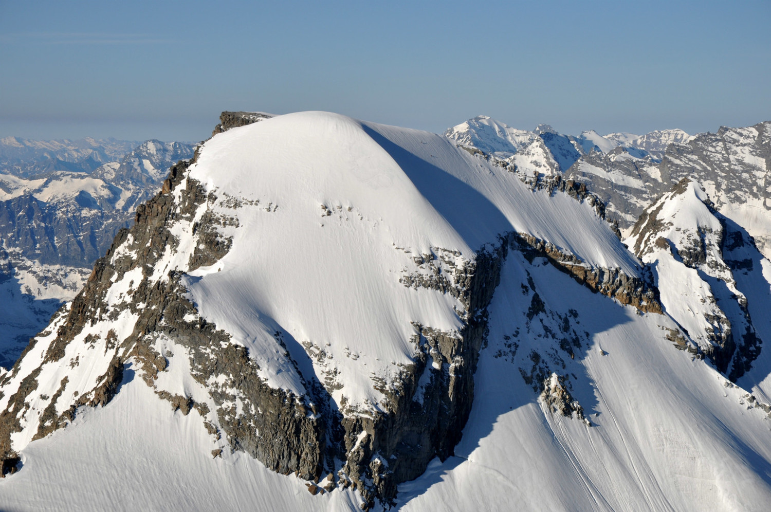 Ciarforon (3641m) : north face. Climbers on the final snow slope