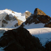 Piz Umur; luci del tramonto su Scerscen e Umur, dai pressi della Tschierva.