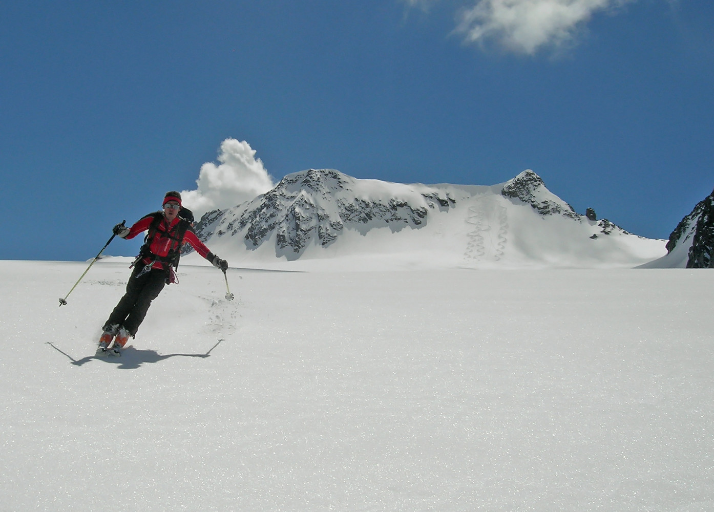 Piz Uffiern; si scende! Il Piz Cristallina, sorveglia...