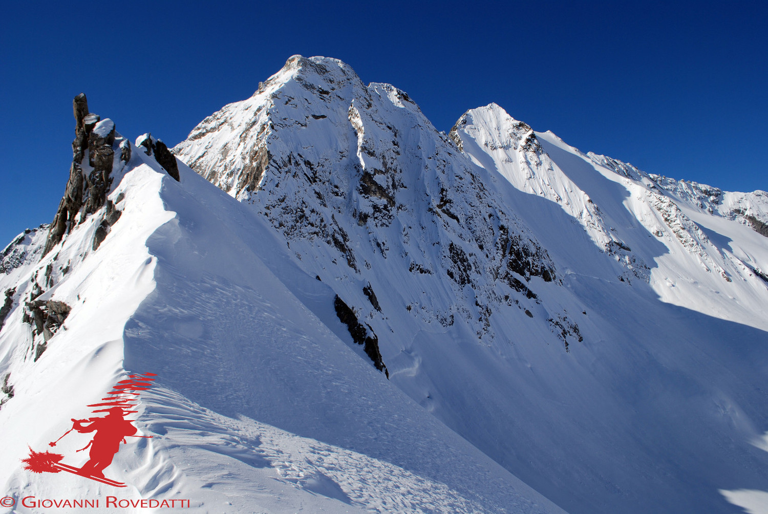 Dal Passo di Vazzeda 2967m, vista sulla Cima di Vezzeda 3297m e sulla Cima di Rosso 3366m