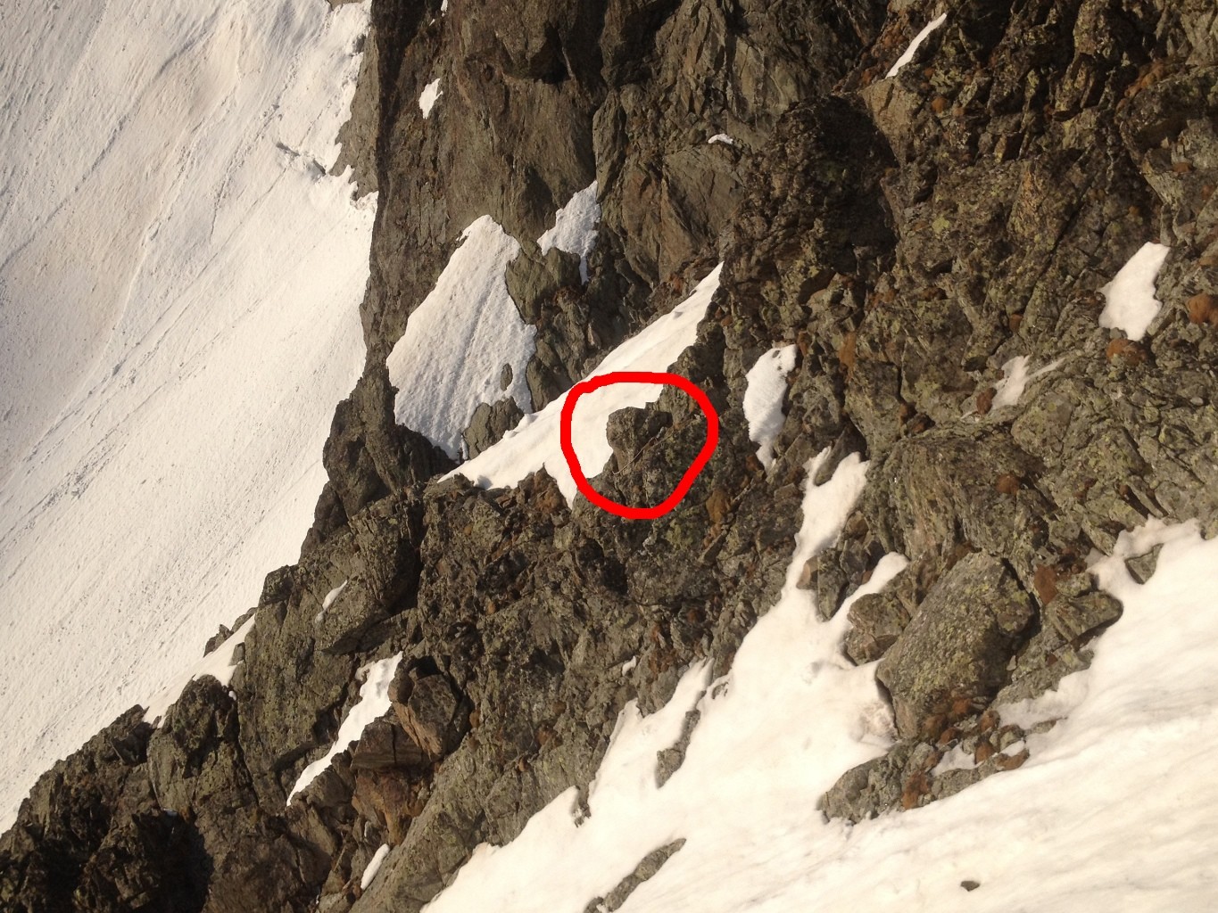 Rappel sur un becquet au dessus de la dalle sous la neige