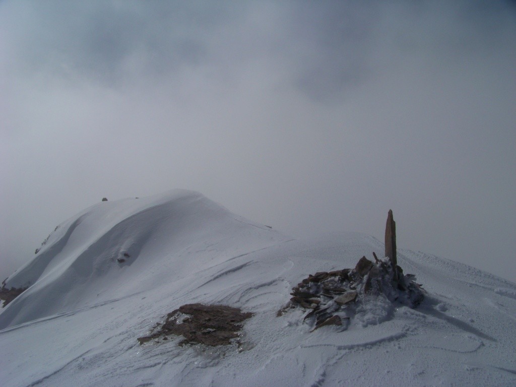 Sommet dans le Brouillard