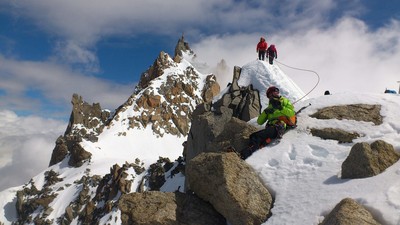 Pause photo dans le vent, arête de Laurence Pause photo dans le vent, arête de Laurence