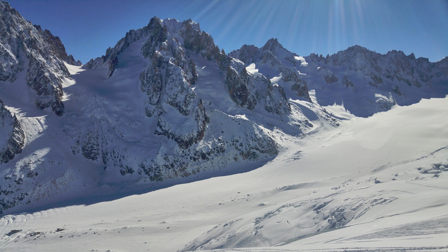 View over the Glacier d'Argentiere valley. Lots of fresh snow and the glacier not yet tracked. Rare view in April