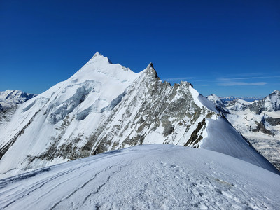 View from the summit towards Weisshorn View from the summit towards Weisshorn